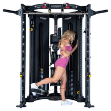 Load image into Gallery viewer, Standing cable glute kickback with ankle strap on the Hoist H8 Functional Trainer