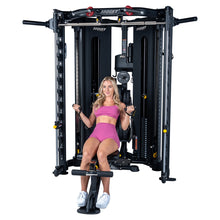 Load image into Gallery viewer, Woman using the dedicated seated low row station on the Hoist H8 Functional Trainer