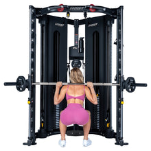 Load image into Gallery viewer, Woman performing a Smith machine squat on the Hoist H8 Functional Trainer, rear view